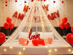 Romantic Happy Anniversary Bed Decoration with Red Heart Balloons & Fairy Lights | JMD Events