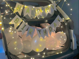 White & Gold Car Boot Birthday Surprise Decoration with Fairy Lights & Cake | JMD Events Gwalior