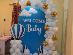Welcome Baby Blue & Gold Balloon Arch with Hot Air Balloon Theme Backdrop