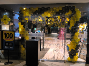 INOX Anniversary Luxury Black & Gold Corporate Event Decoration with Balloon Arch & Ceiling Styling | By JMD Events