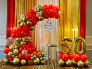 Golden Anniversary Balloon Decoration Setup with Red & Gold Theme (50th Anniversary)