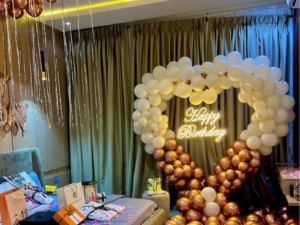 Luxury White & Rose Gold Birthday Room Decoration with Balloon Arch & Neon Sign | JMD Events