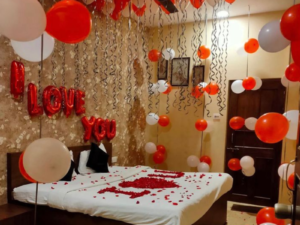 Romantic Red & White “I Love You” Bedroom Decoration with Hanging Balloons | JMD Events