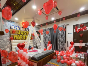 Romantic “Just Married” Room Decoration with Red Heart Balloons & Rose Petals | JMD Events